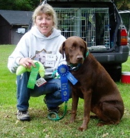 Porter with his mom and his ribbons